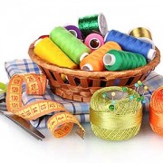 bright threads in basket, scissors and measuring tape